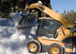 skid-steer-loader-snow-cleanup